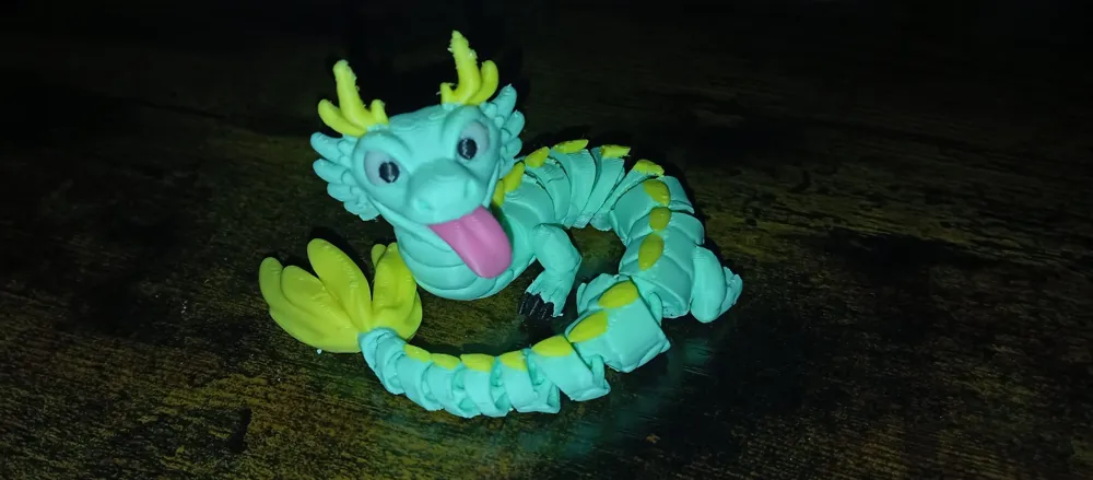 Articulated Flexi Dragon - Free 3D Print Model - MakerWorld