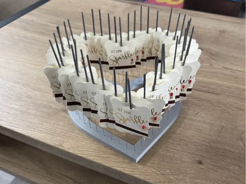 Heart-shaped magic sparklers display