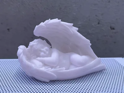 sleeping angel on wings