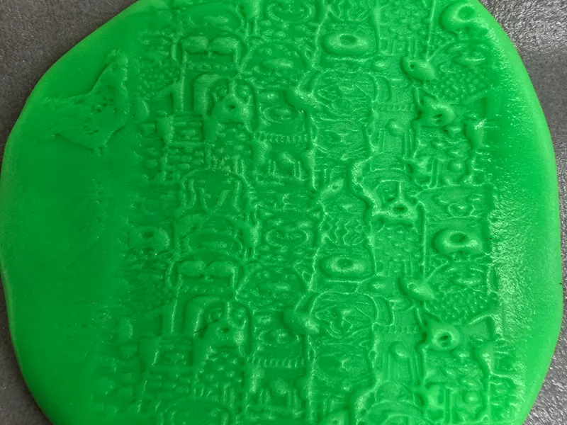 Dog impress roller for clay