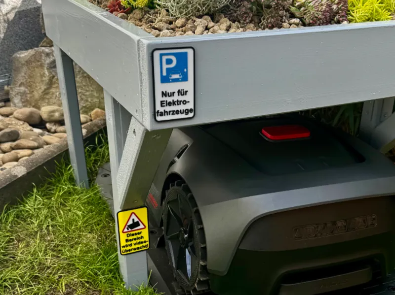 Mini traffic signs for robotic lawn mowers garage