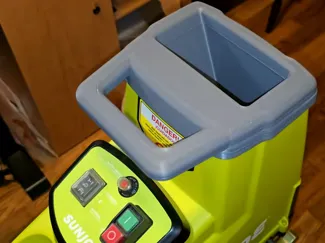 Wood chipper chute and plunger