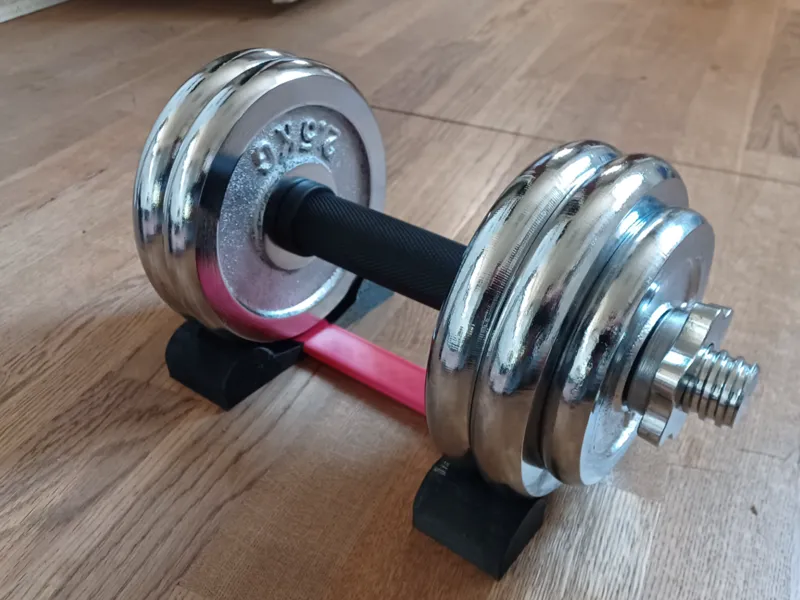 No roll , no bump "universal" dumbbell holder.