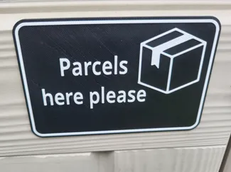 Parcels Here Sign