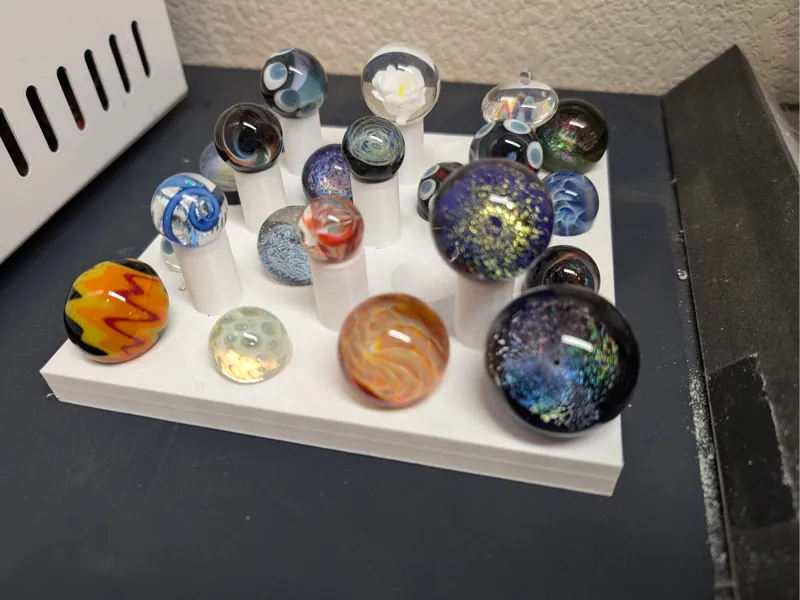 Storage rack for art glass marbles