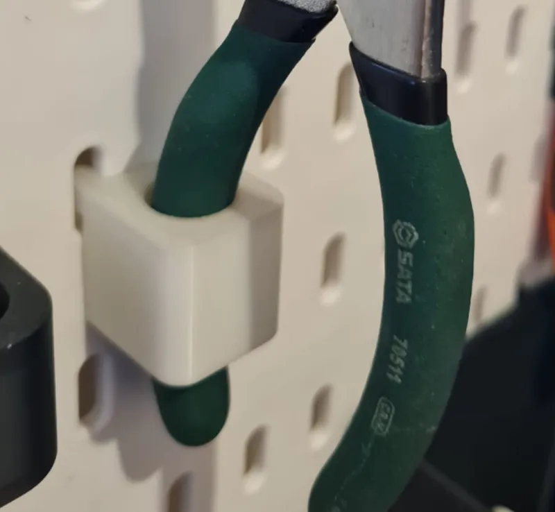 Plier peg wall holder