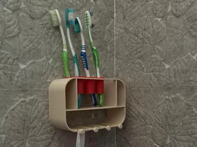 Toothbrush organizer wall mount