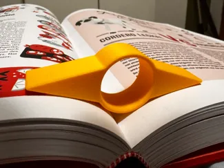 Lesehilfe / Buchspreitzer