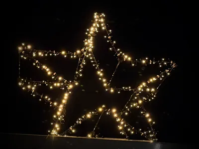 Christmas star plug-in system made of fiberglass rods
