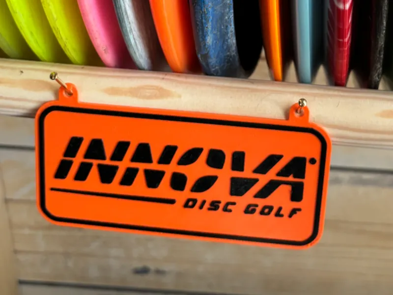 Innova Disc Golf Logo with Hanging holes