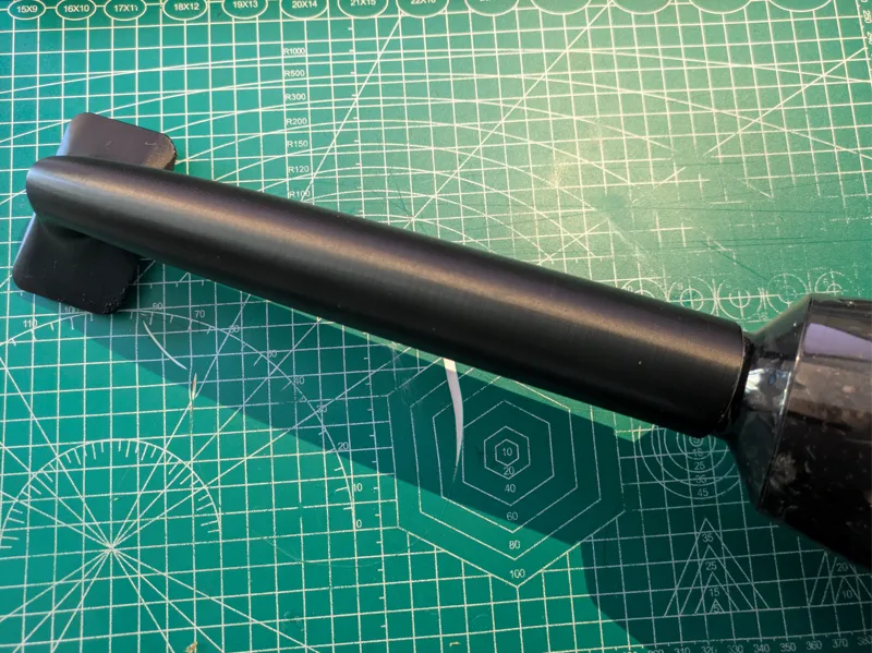 Handheld vacuum nozzle extender