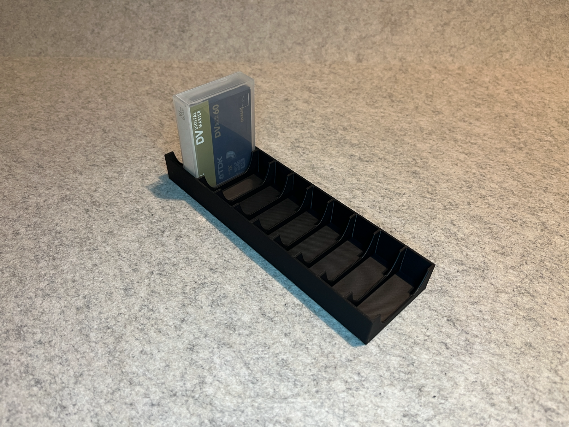 Stand holder for MiniDV tapes