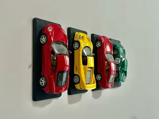 Wall stand for 1:43-scale car w/ double-sided tape