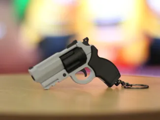 Revolver Fidget Keychain – Slide-Action Toy