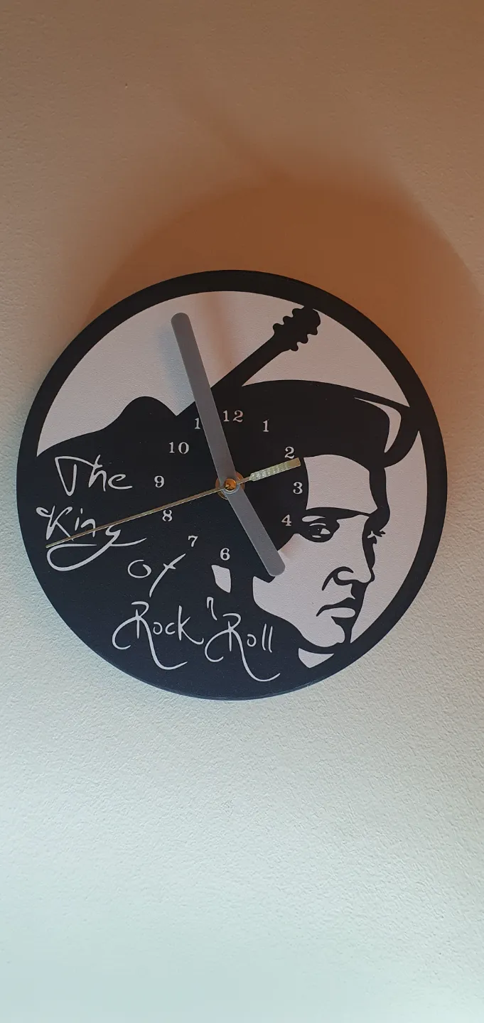 Elvis "The king of rock and roll) wall clock