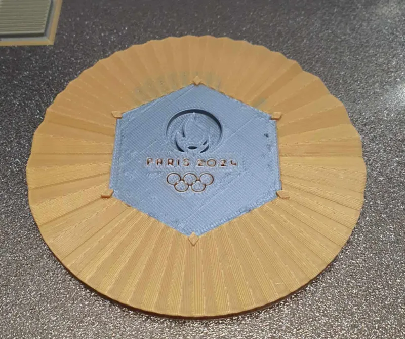 Replica of the Olympic gold medal