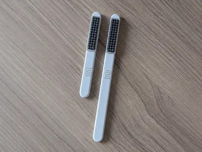 Rounded nozzle wiper brush - quick print
