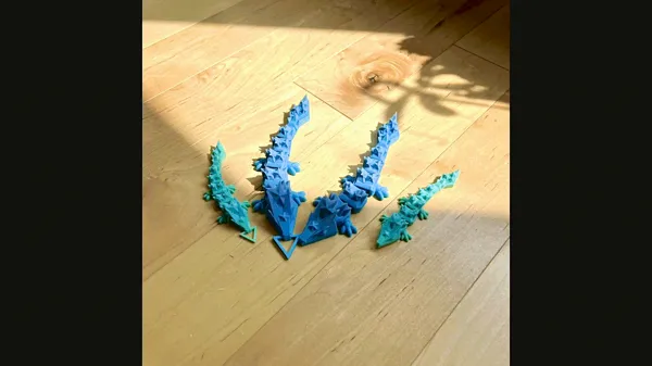 Porte-clés dragon étoile filante articulé