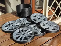 Pack of six wheel coasters + holder