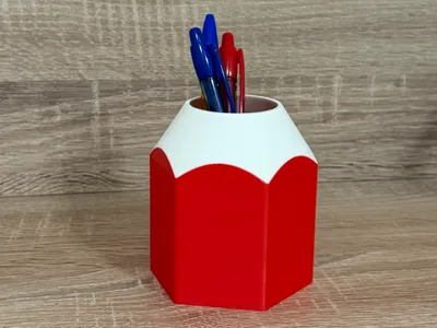 Pencil holder in the shape of a pencil