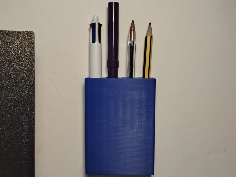 Wall mounted stationary holder