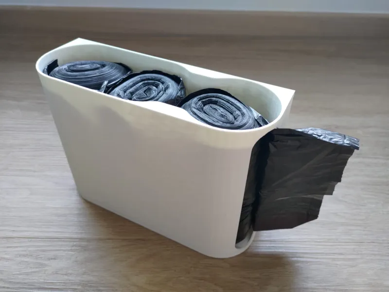 Garbage bag storage holder