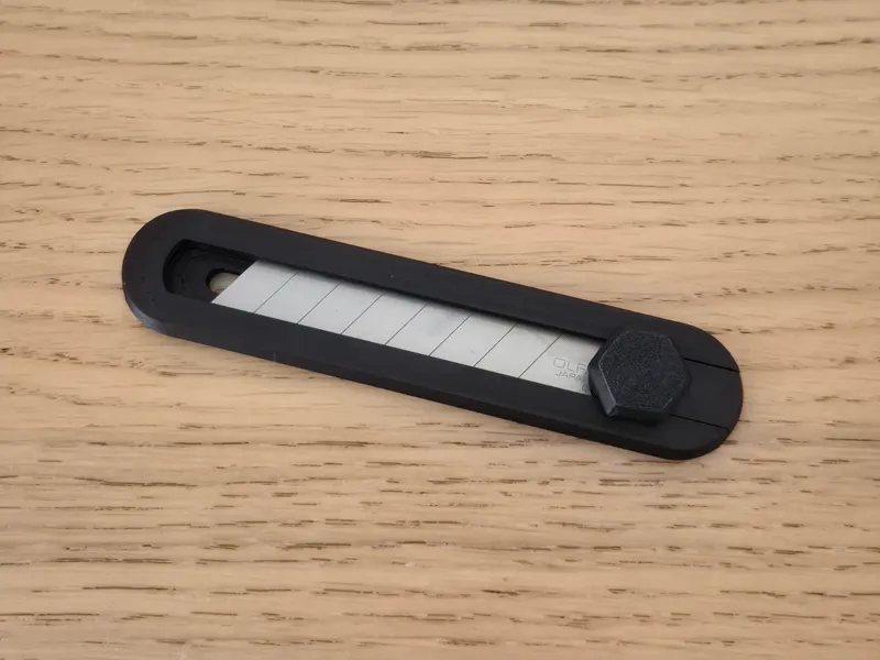 Improved Slider for Utility Knife Case