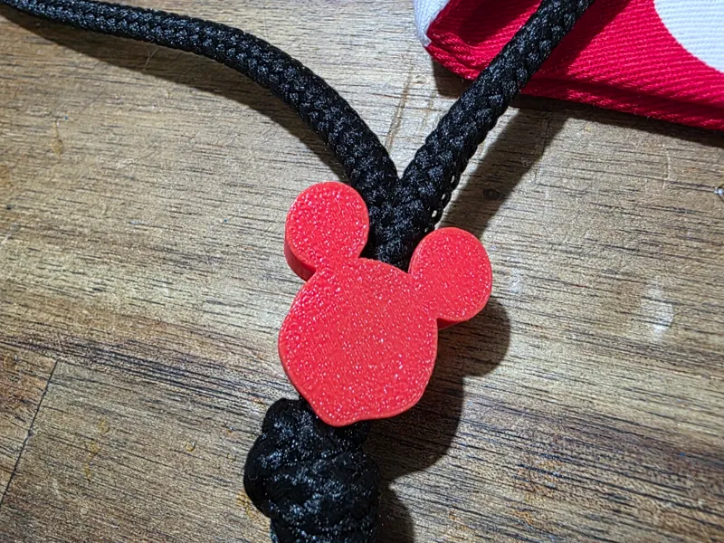 Drawstring end toggle/charm
