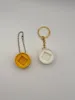 Sports ball round base with keychain hole