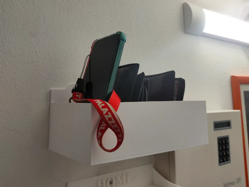 Porta portafogli e telefoni da parete