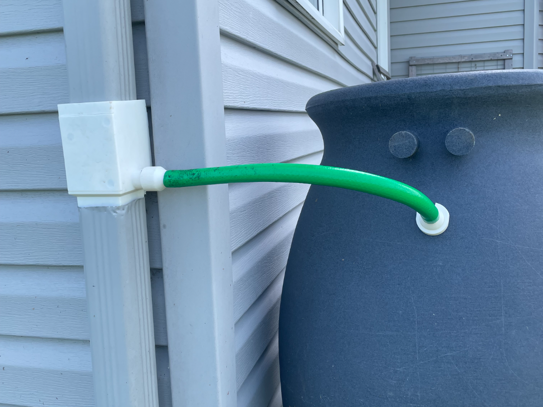 Rainwater diverter with access hatch