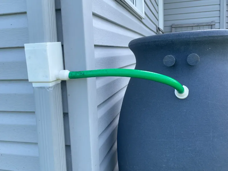 Rainwater diverter with access hatch