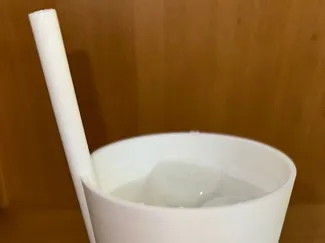 Cup with straw