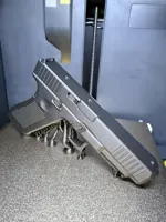 Glock with magnet holes