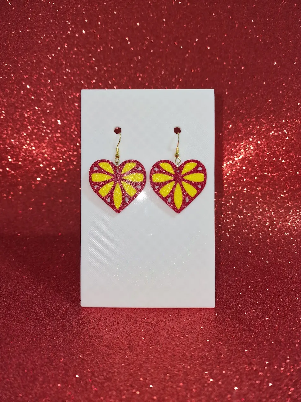 Flower on heart earrings view 2