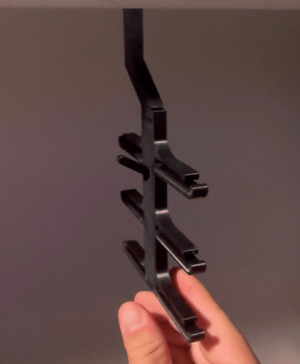 Print-In-Place Spinning Belt and Tie Hanger