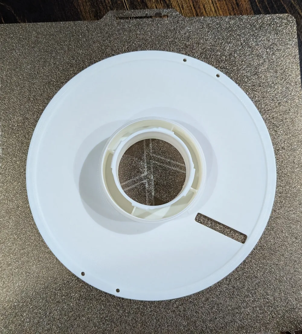 bambu-spool-with-filament-window-remixed-by-petezilla-makerworld