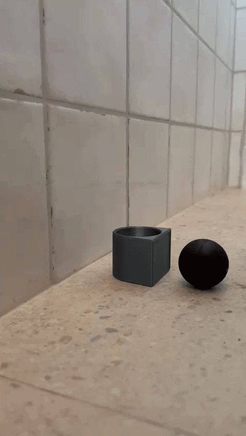 Squash ball doorstop