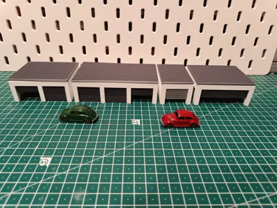Garages with movable sectional doors in H0