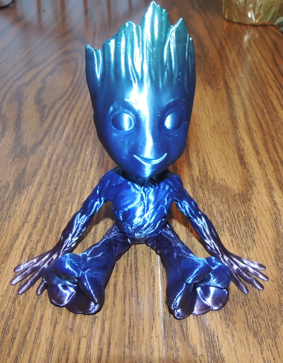 Groot assis, haute définition