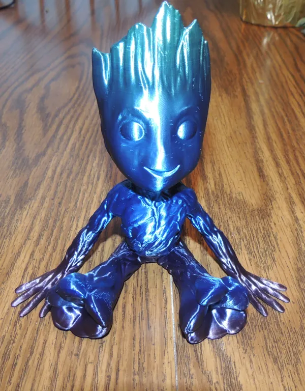 Groot assis, haute définition