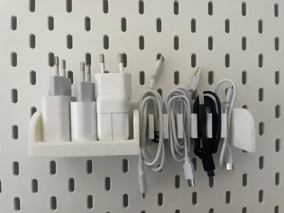 Ikea Skadis organizer for cables and chargers