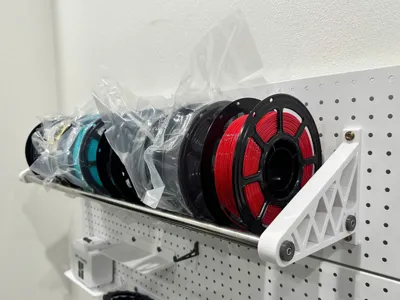 Filament spool wall holder