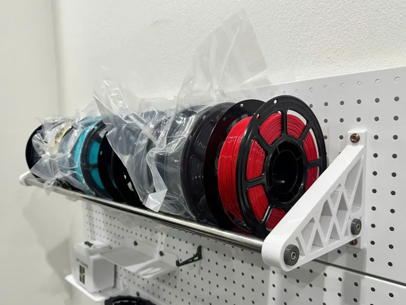 Filament spool wall holder