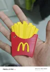 French fry letters printed piece by piece, red base with support