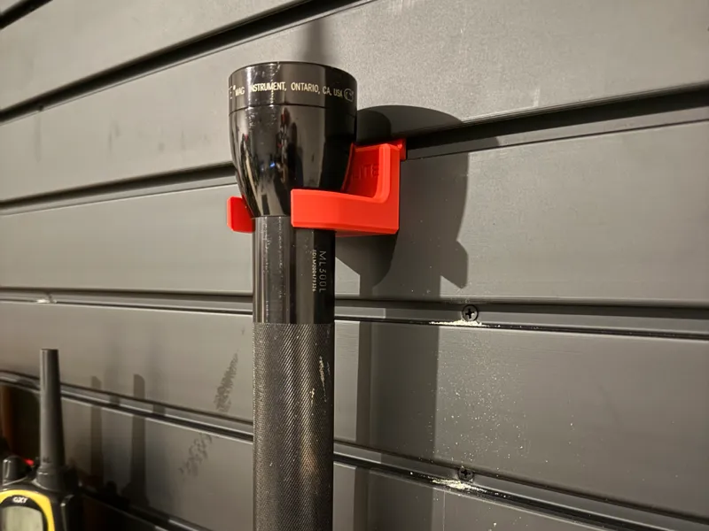Slat wall Maglite C-cell battery flashlight holder