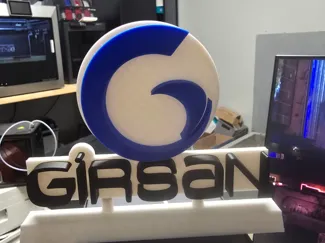 Girsan logo sign stand