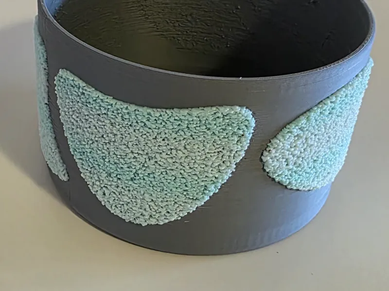 Fuzzy vase with organic shapes