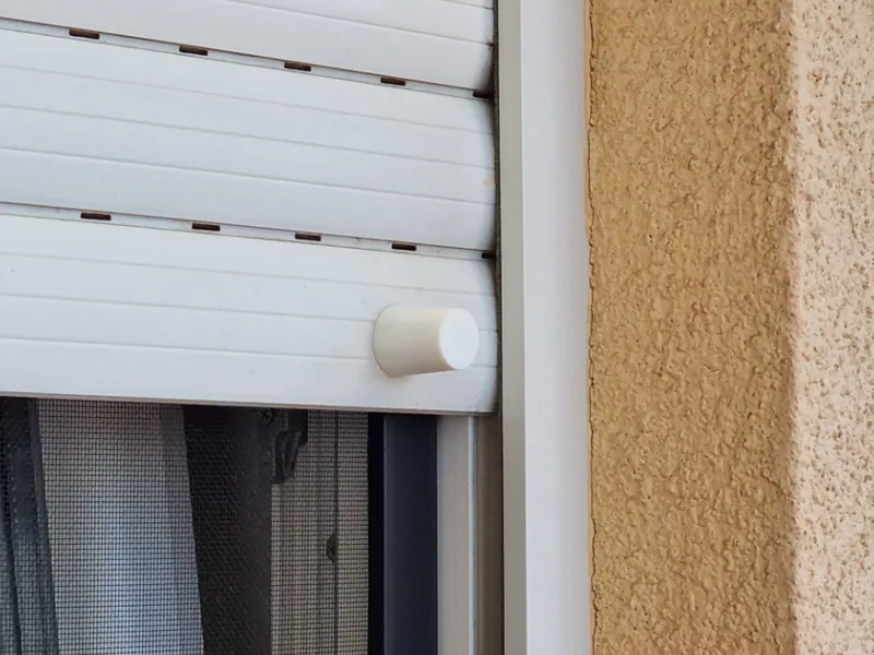 Stopper for window roller shutters