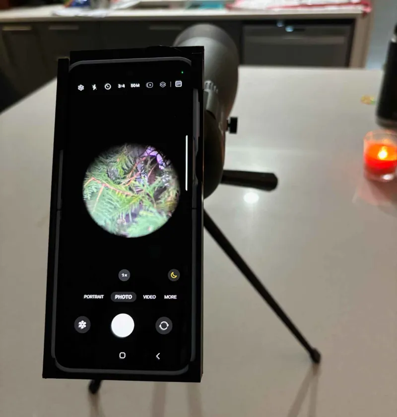 Spotting scope phone adapter